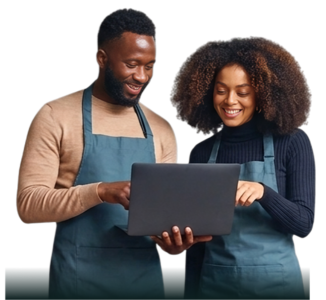 Restaurant employees reviewing laptop together.